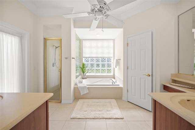 bathroom featuring vanity, tile patterned floors, crown molding, ceiling fan, and shower with separate bathtub