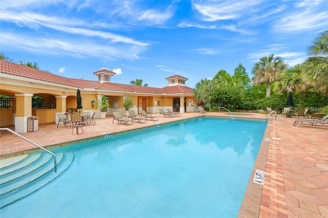 view of pool with a patio