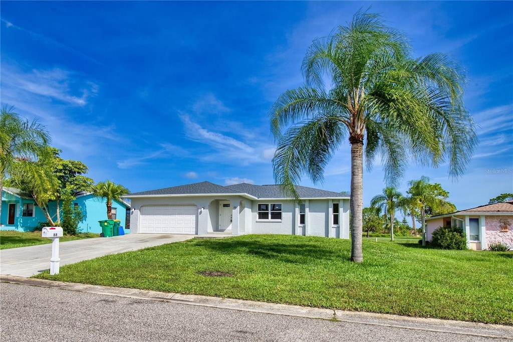 ranch-style house with a front lawn and a garage