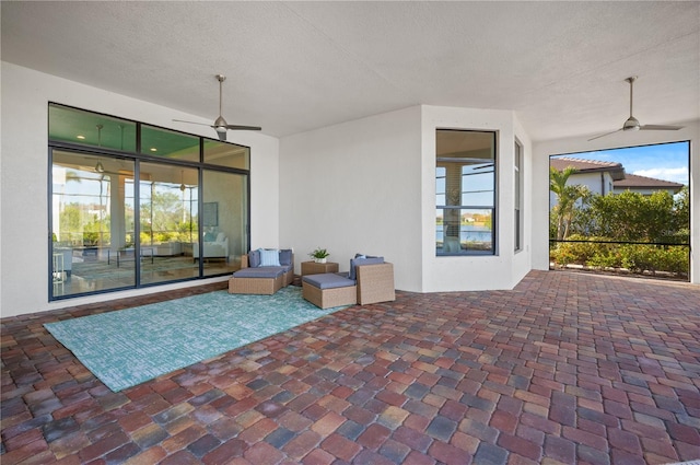 view of patio with ceiling fan