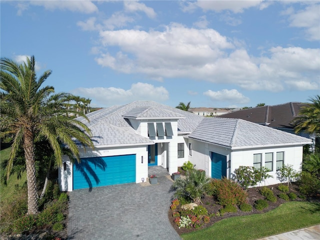 view of front of property featuring a garage