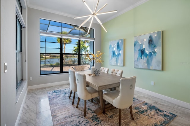 dining room featuring crown molding and a chandelier