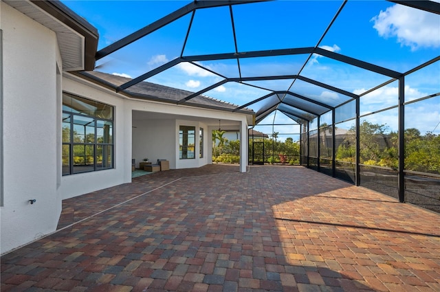 view of patio / terrace with a lanai