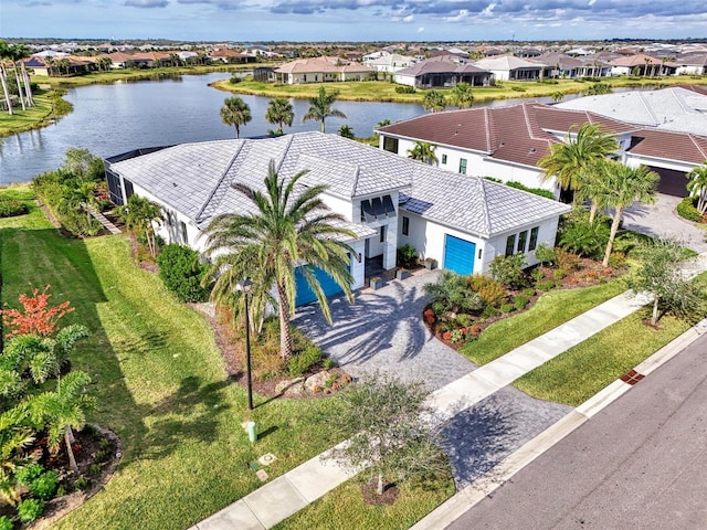 bird's eye view with a water view