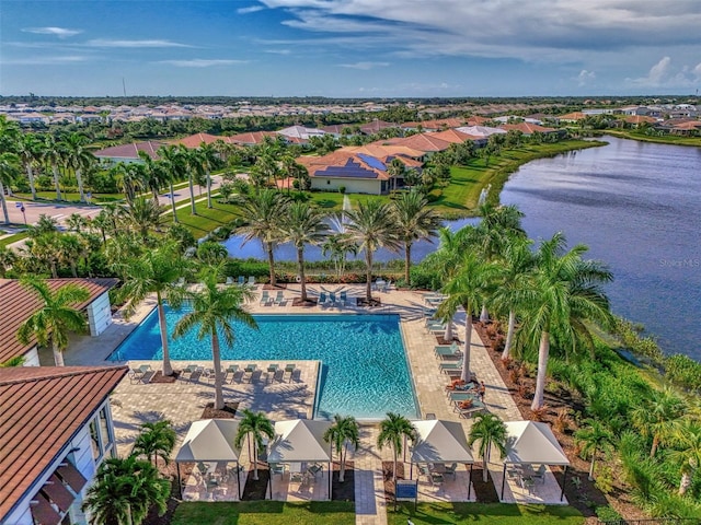 pool featuring a water view and a residential view