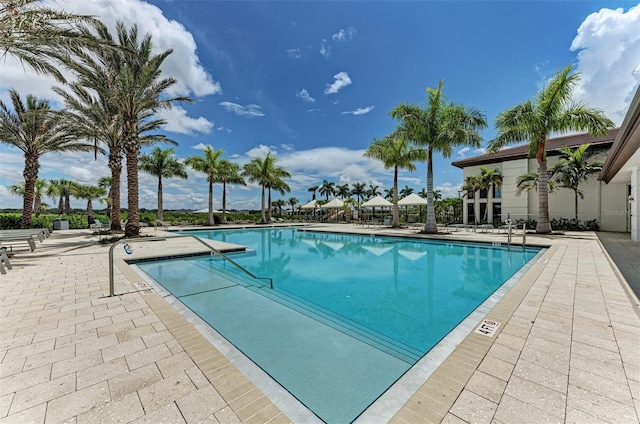 community pool with a patio