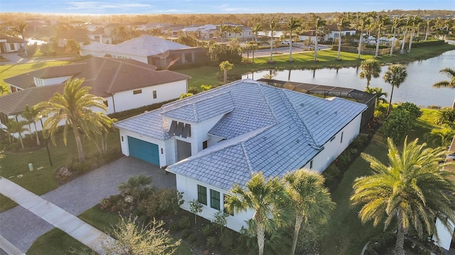 birds eye view of property featuring a residential view and a water view