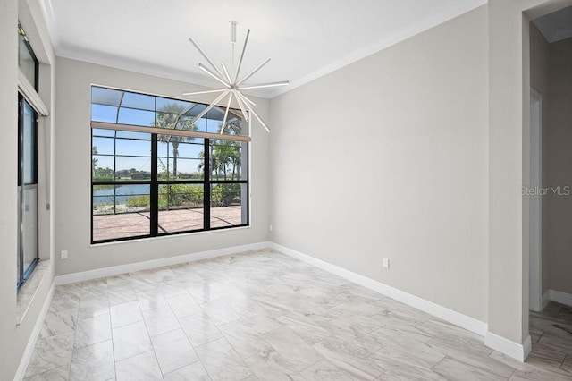 spare room featuring crown molding, marble finish floor, baseboards, and a notable chandelier