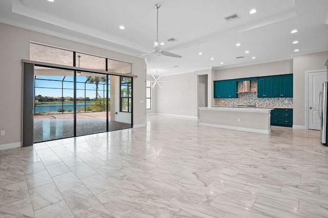 unfurnished living room featuring crown molding, visible vents, marble finish floor, and a ceiling fan