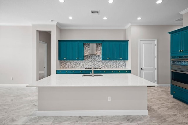 kitchen with light stone counters, backsplash, wall chimney range hood, visible vents, and a sink