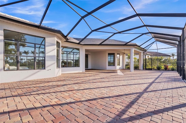 view of patio with a lanai