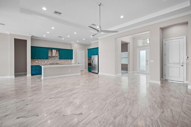 4779 Pastel Ct, Sarasota, FL 34240 - unfurnished living room with ornamental molding, a ceiling fan, recessed lighting, and light marble finish flooring