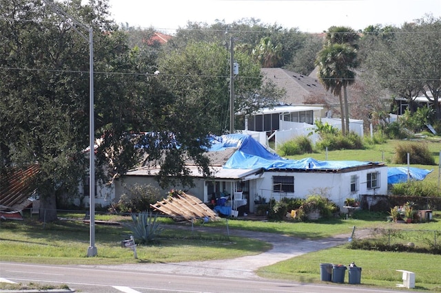 exterior space with a front lawn