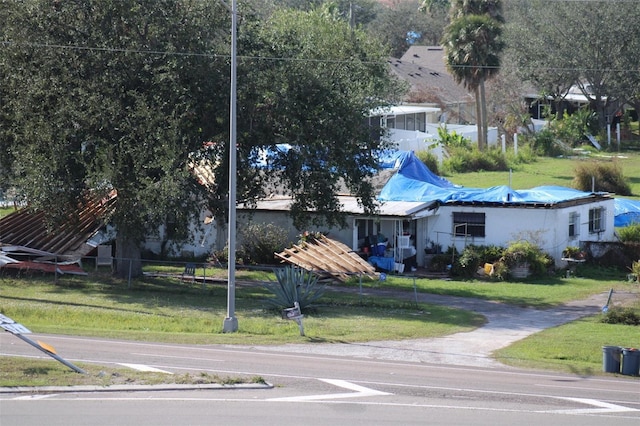 exterior space with a front lawn