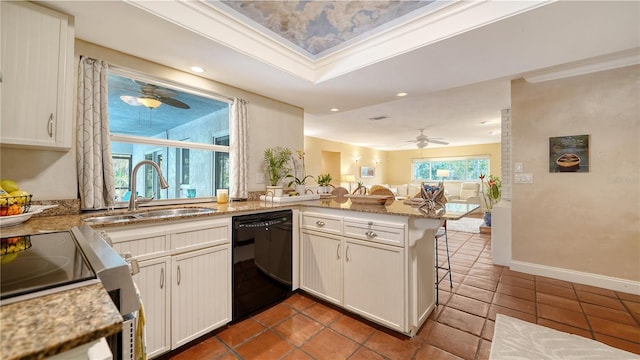 kitchen with ornamental molding, dishwasher, kitchen peninsula, and sink