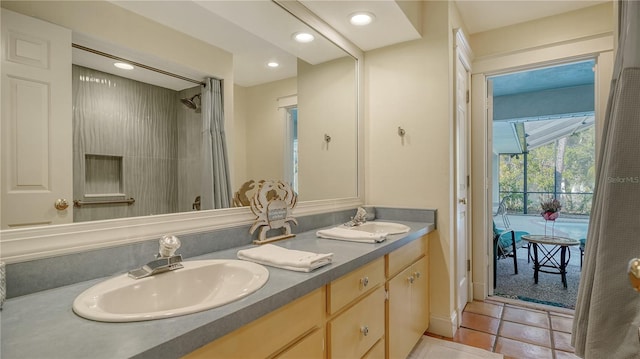 bathroom featuring tile patterned floors and vanity