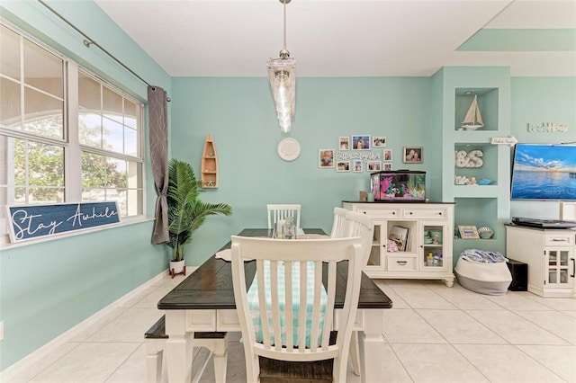 dining room with light tile patterned flooring