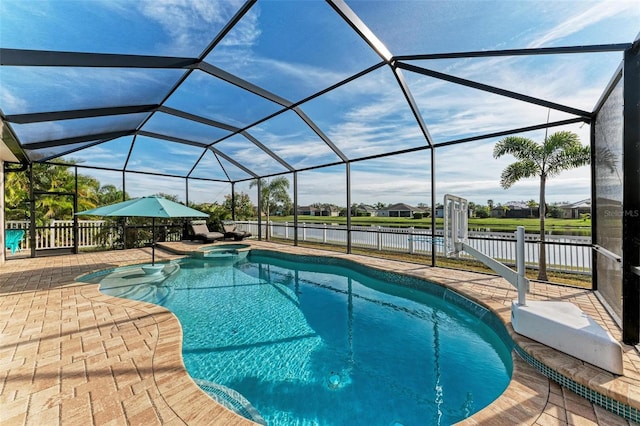 view of pool with a water view, a patio area, and a lanai