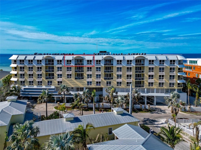 view of building exterior with a water view