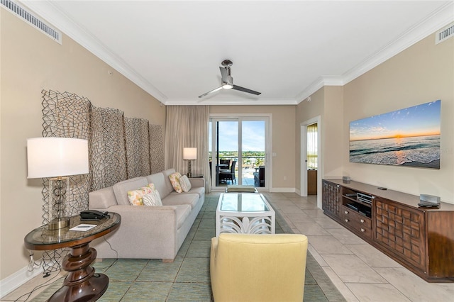 living room with ceiling fan, light tile patterned flooring, and crown molding