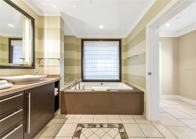 bathroom with tile patterned flooring, vanity, ornamental molding, and a washtub