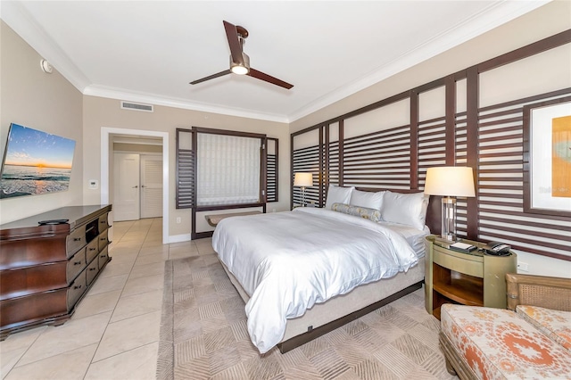 tiled bedroom featuring ceiling fan and ornamental molding