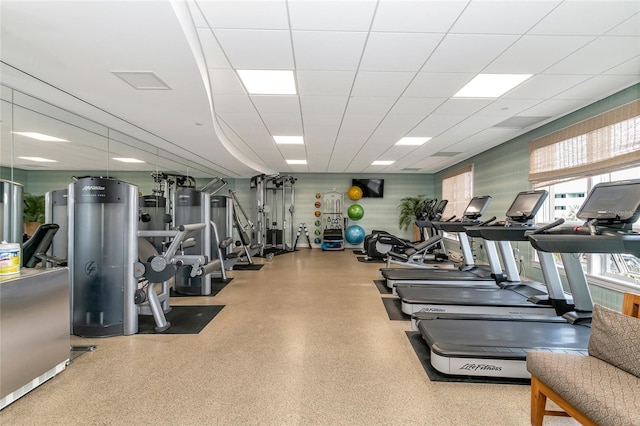 gym featuring a drop ceiling