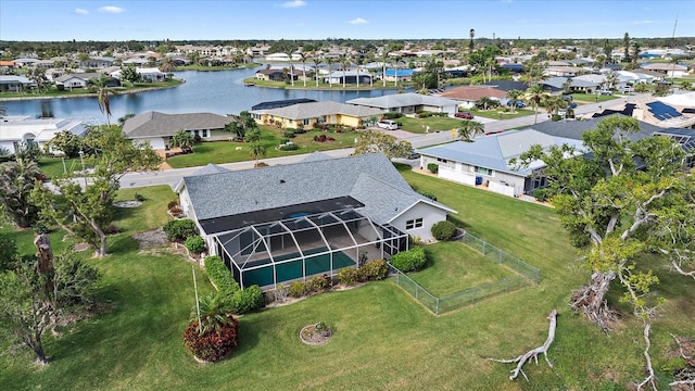 bird's eye view with a water view