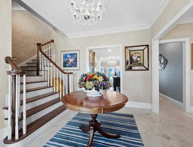 entryway featuring a chandelier and ornamental molding