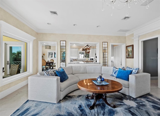 tiled living room featuring visible vents, baseboards, a chandelier, and crown molding