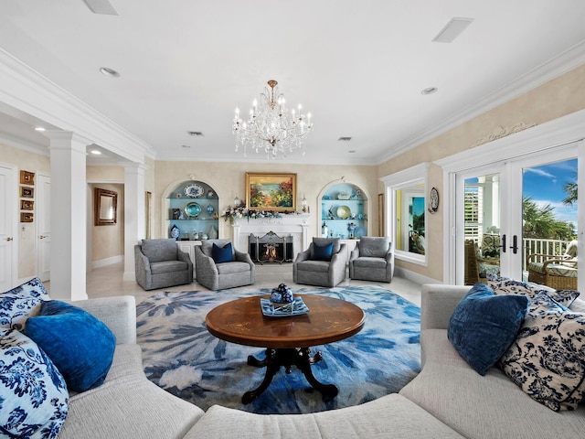 living room with french doors, a chandelier, ornamental molding, and built in shelves