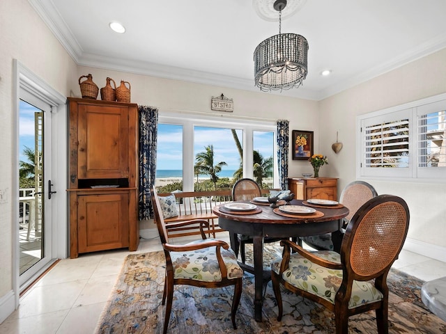 dining space featuring crown molding, light tile patterned floors, recessed lighting, and a chandelier