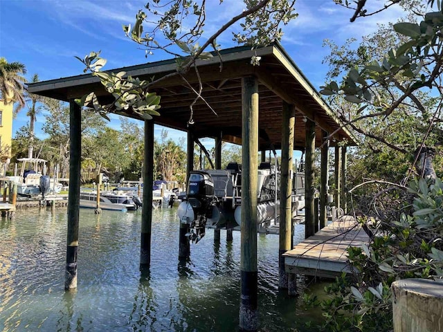 view of dock with a water view