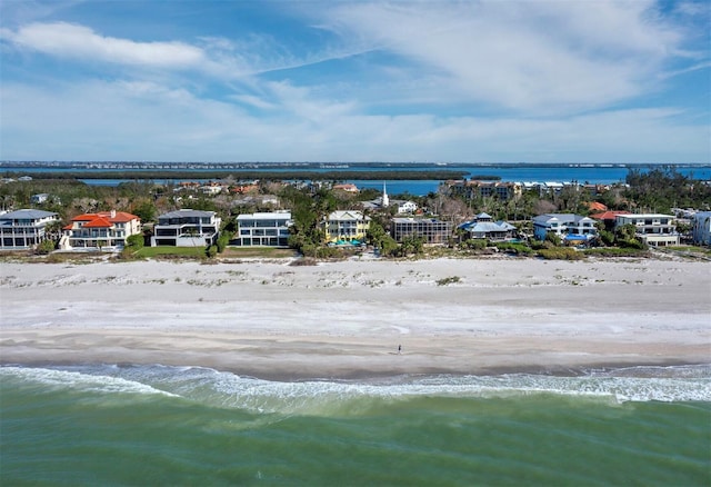 bird's eye view with a beach view and a water view