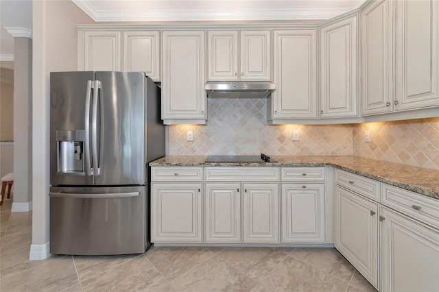 kitchen featuring black electric stovetop, light stone counters, crown molding, white cabinets, and stainless steel fridge with ice dispenser