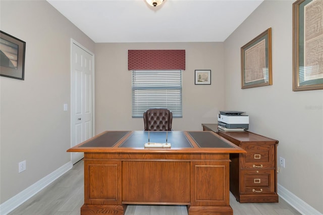 home office featuring light hardwood / wood-style flooring