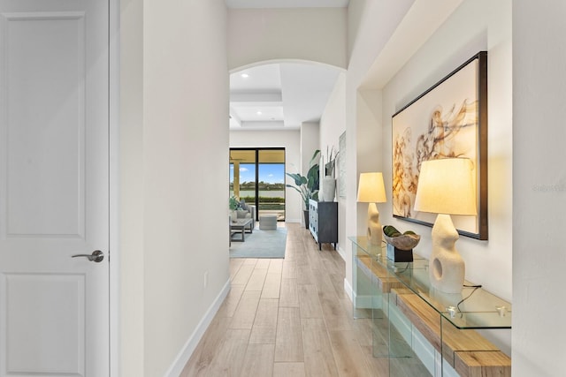 corridor featuring light hardwood / wood-style floors