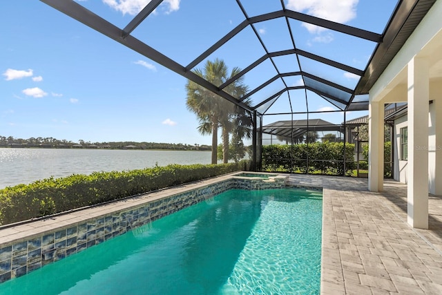 view of pool featuring a lanai, a patio area, and a water view