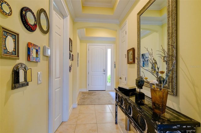 interior space featuring crown molding and light tile patterned floors