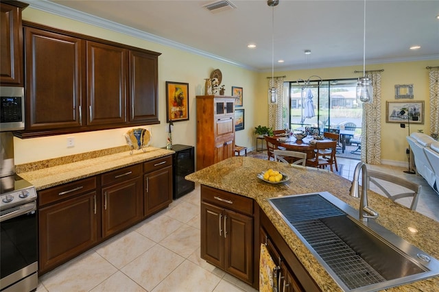 kitchen with sink, appliances with stainless steel finishes, decorative light fixtures, light tile patterned flooring, and ornamental molding