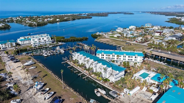 drone / aerial view featuring a water view