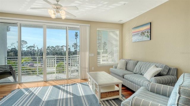 interior space with ceiling fan