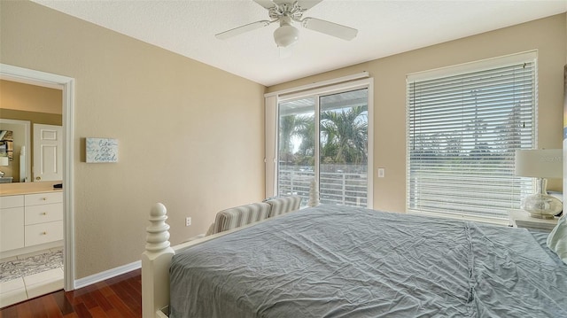 bedroom with a textured ceiling, ceiling fan, dark hardwood / wood-style floors, and access to outside