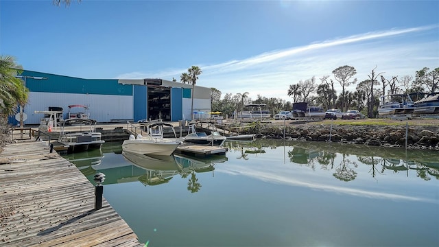 dock area with a water view