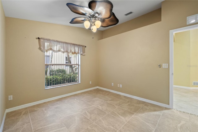 unfurnished room featuring ceiling fan