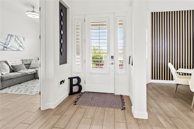 foyer entrance featuring light hardwood / wood-style flooring