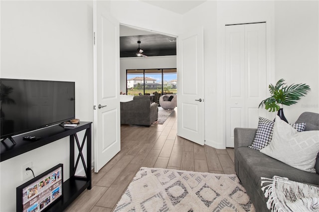 living room featuring ceiling fan