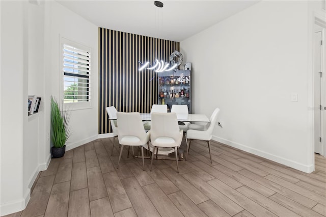 dining room with light hardwood / wood-style flooring