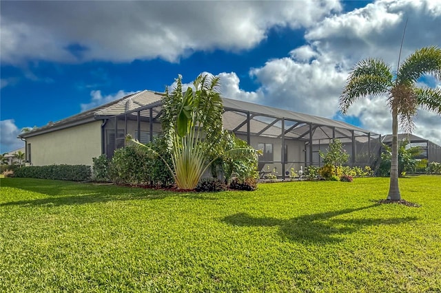 view of yard with a lanai