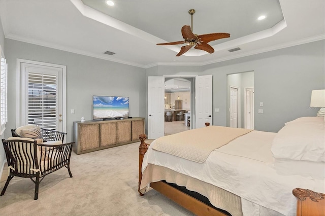 bedroom featuring a raised ceiling, light colored carpet, ceiling fan, and crown molding